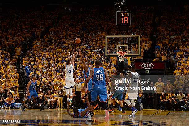 Stephen Curry of the Golden State Warriors shoots the ball against the Oklahoma City Thunder during Game Seven of the Western Conference Finals...