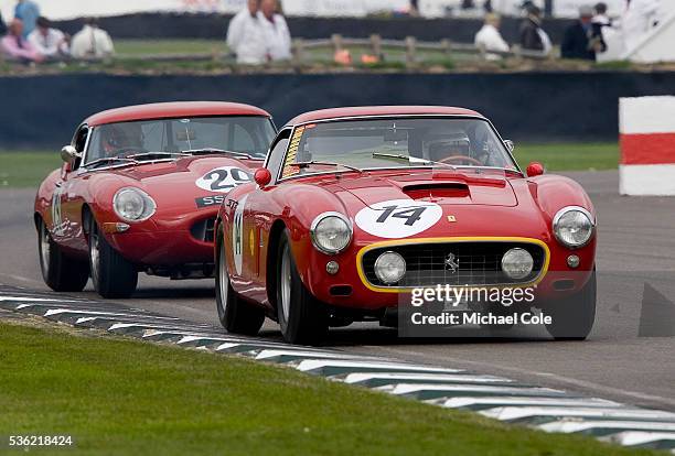 Ferrari 250 GT SWB/C in the RAC TT Celebration Race driven by Kilian Konig/Brian Redman hotly pursued by Tiff Needell in a 1961 Jaguar E-Type