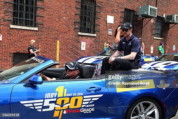 May 28: Race car driver Charlie Kimball makes his way South on Pennsylvania Street during the Indianapolis 500 Festival Parade in downtown...