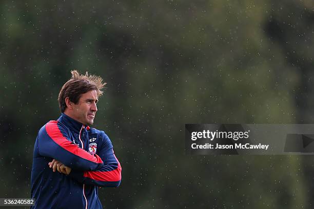 Andrew Johns halves coach of the Roosters watches on during a Sydney Roosters NRL training session at Moore Park on June 1, 2016 in Sydney, Australia.