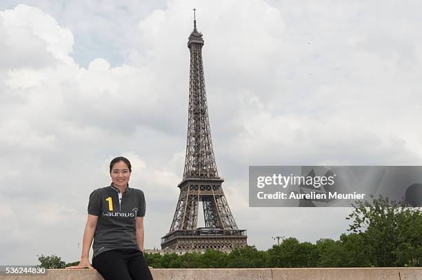 Former Tennis player and new Laureus Academy Member Li Na poses during the Li Na Laureus Academy Member Announcement at the Eiffel Tower on May 27,...