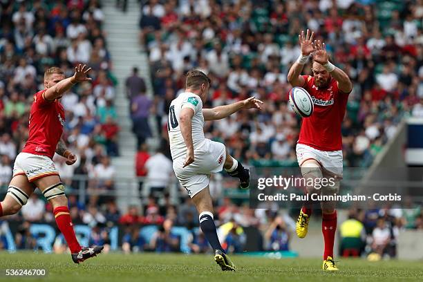 George Ford of England looks to clear the ball upfield during the Old Mutual Wealth Cup between England and Wales at Twickenham Stadium on May 29,...