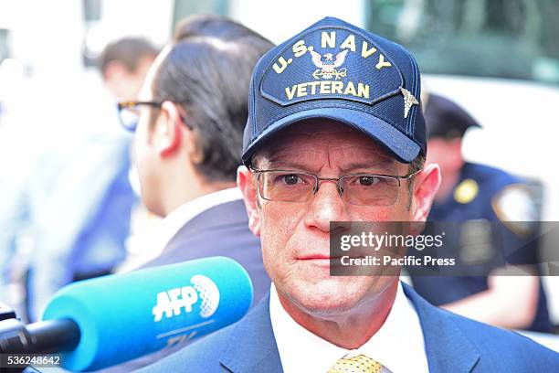 New Hampshire representative and Trump supporter Ray Doucette chats with press. Pro and anti Trump activists gathered outside Trump Towers during...