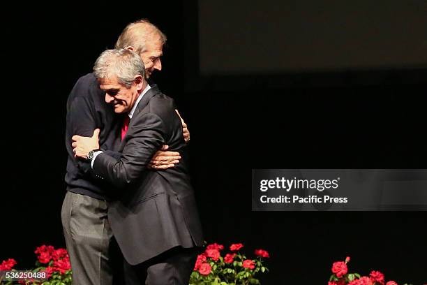 The President of the Piedmont Region Sergio Chiamparino and Mayor Piero Fassino embrace at the Teatro Alfieri for the closing of the campaign of the...
