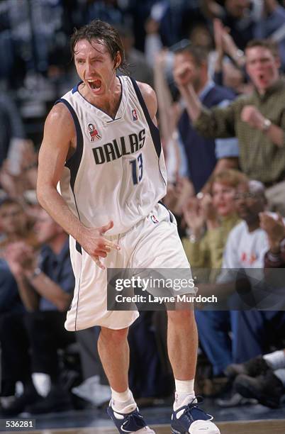 Point guard Steve Nash of the Dallas Mavericks celebrates during the NBA game against the Detroit Pistons at American Airlines Arena in Dallas,...