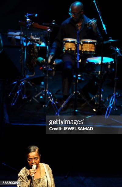 Cape Verde singer Cesaria Evora , who is known as "Bare foot Diva," performs during a live concert at the UCLA Royce Hall in Los Angeles on October...