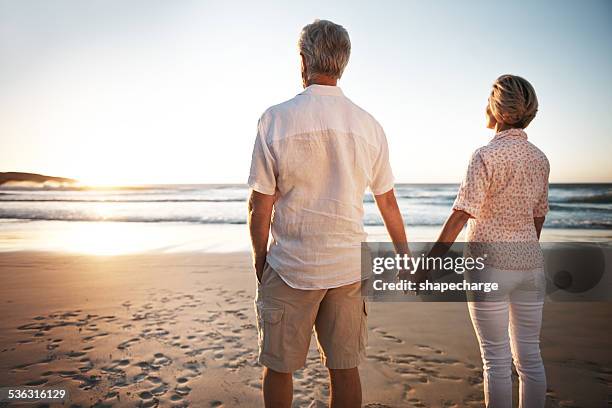 sometimes when people say forever, they mean it - watching sunset stock pictures, royalty-free photos & images