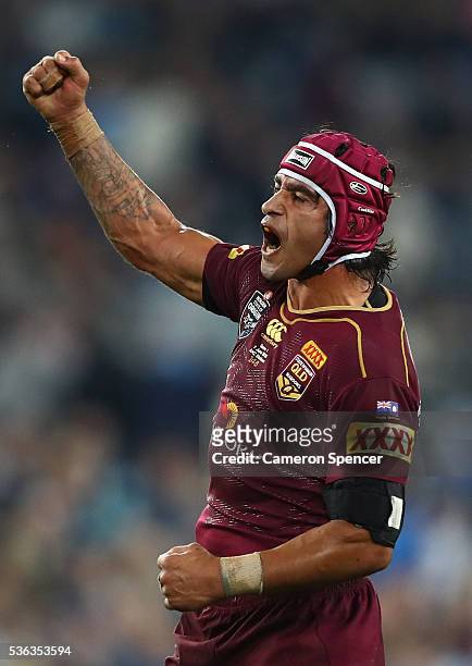 Johnathan Thurston of the Maroons celebrates winning game one of the State Of Origin series between the New South Wales Blues and the Queensland...