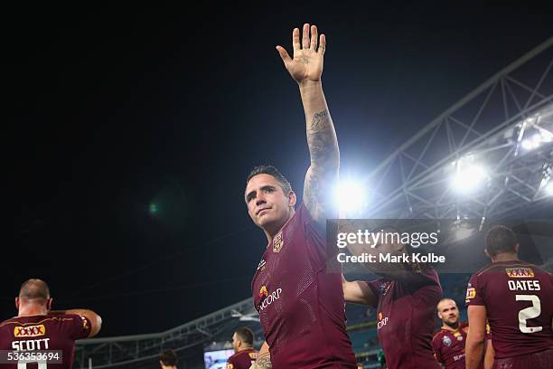 Corey Parker of the Maroons waves to the crowd as he celebrates victory during game one of the State Of Origin series between the New South Wales...