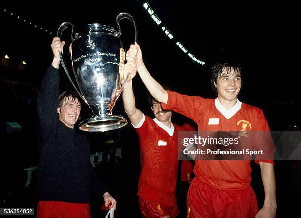 Liverpool's Scottish players, Kenny Dalglish , Graeme Souness and Alan Hansen carrying the trophy after the UEFA European Cup Final between Liverpool...