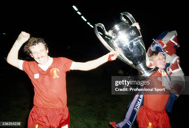 Liverpool's winning goalscorer Alan Kennedy and Sammy Lee celebrating with the trophy after the UEFA European Cup Final between Liverpool and Real...