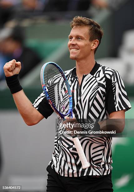 Tomas Berdych of Czech Republic celebrates victory during the Men's Singles fourth round match against David Ferrer of Spain on day eleven of the...