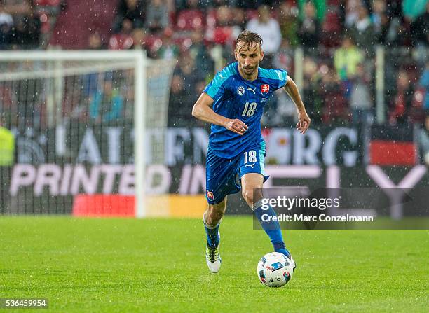 Dusan Svento of Slovakia with ball during the international friendly match between Germany and Slovakia at WWK-Arena on May 29, 2016 in Augsburg,...