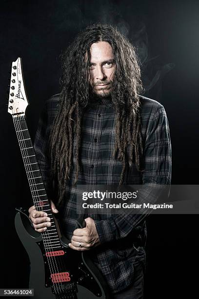 Portrait of American musician James Shaffer, better known by his stage name Munky, photographed before a live performance with nu-metal group Korn at...