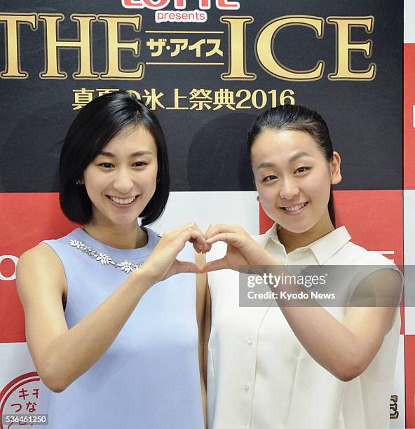 Figure skater Mao Asada and her sister Mai pose for a photo during a press conference in Nagoya on June 1 for a three-day ice show beginning Aug. 5...