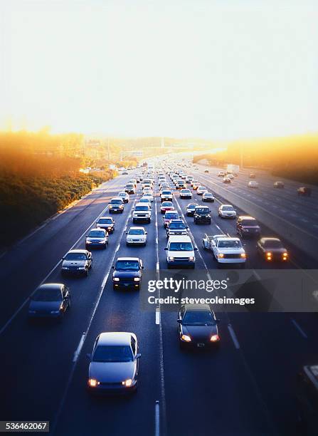 cars and simi-trucks on expressway in downtown atlanta, georgia - traffic jam stock pictures, royalty-free photos & images