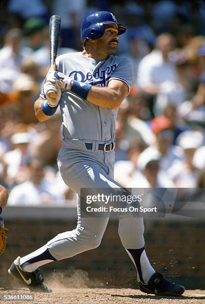 Kirk Gibson of the Los Angeles Dodgers bats against the Chicago Cubs during an Major League Baseball game circa 1988 at Wrigley Field in Chicago,...