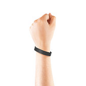 Blank black rubber wristband mockup on hand, isolated