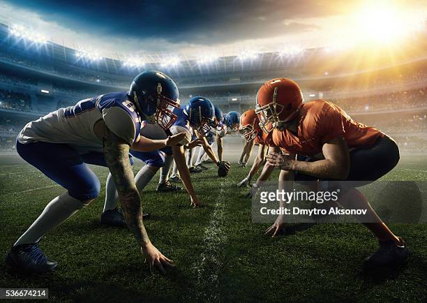 gioco del calcio americano squadre testa a testa - diverbio foto e immagini stock