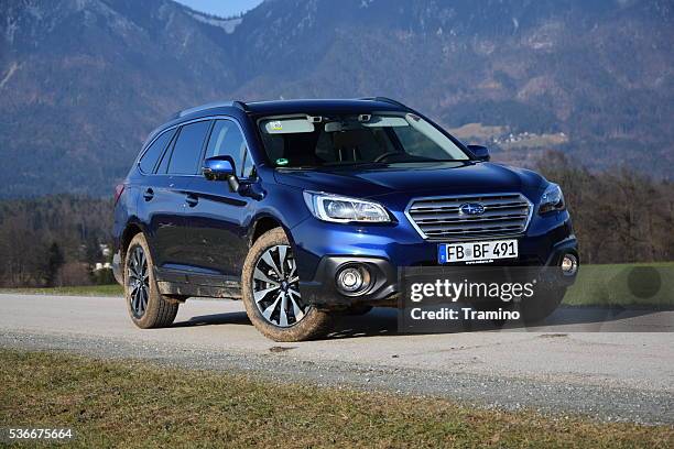 subaru outback on the road - outback stock pictures, royalty-free photos & images