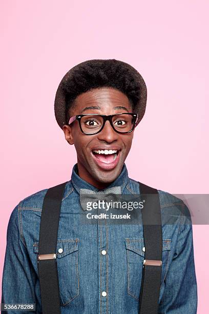 portrait of excited afro american young man - suspenders stock pictures, royalty-free photos & images