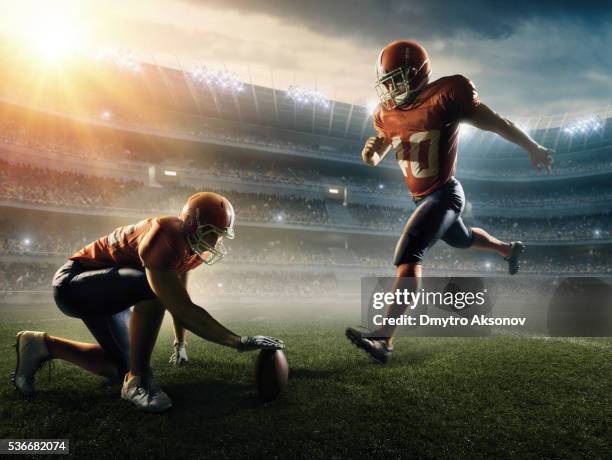 american football kick off - american football player studio stock pictures, royalty-free photos & images