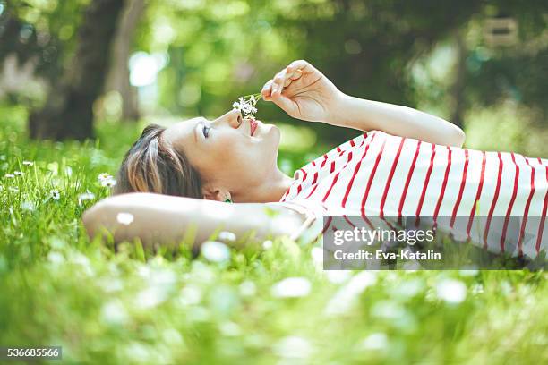 ruhige moment - woman daydreaming stock-fotos und bilder