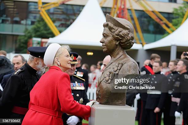 Princess Michael of Kent examines a bronze bust of Queen Elizabeth II at the Honourable Artillery Company on June 1, 2016 in London, England. The...