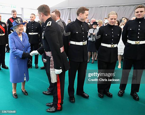 Queen Elizabeth II meets guests at the Honourable Artillery Company on June 1, 2016 in London, England. The engagement marks the Queen becoming the...