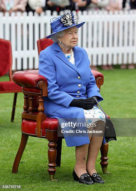 Queen Elizabeth II listens to a speech at the Honourable Artillery Company on June 1, 2016 in London, England. The engagement marks the Queen...