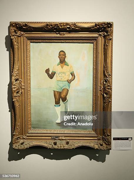 Painting by Almeida presented to Brazilian footballer Pele to mark the 1958 World Cup is on display during a photocall for Pele: The Collection...