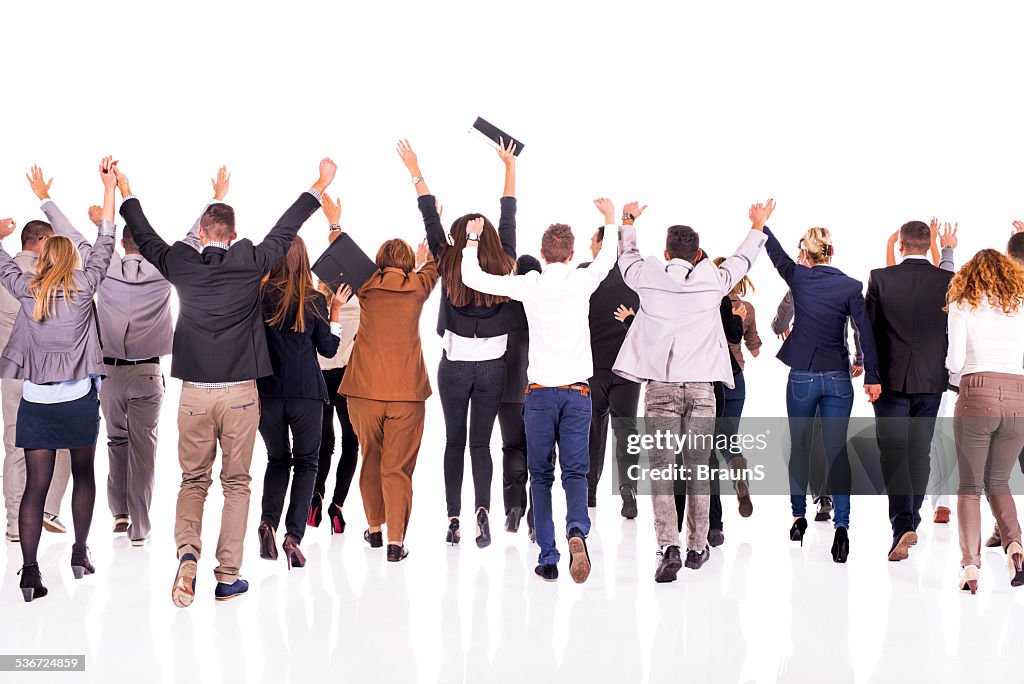 Business people with raised hands.
