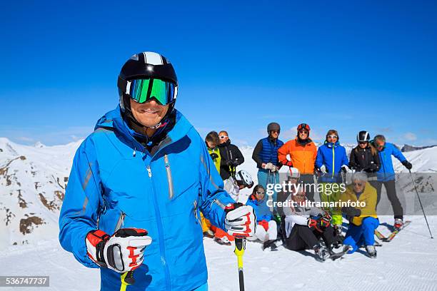 happy men snow skier enjoying sunbathe on sunny ski resorts - happy skier stockfoto's en -beelden