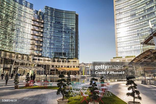 gae aulenti square in milan (italy) - lakeside shopping centre stock pictures, royalty-free photos & images