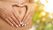 Body care, pregnancy or diet concept