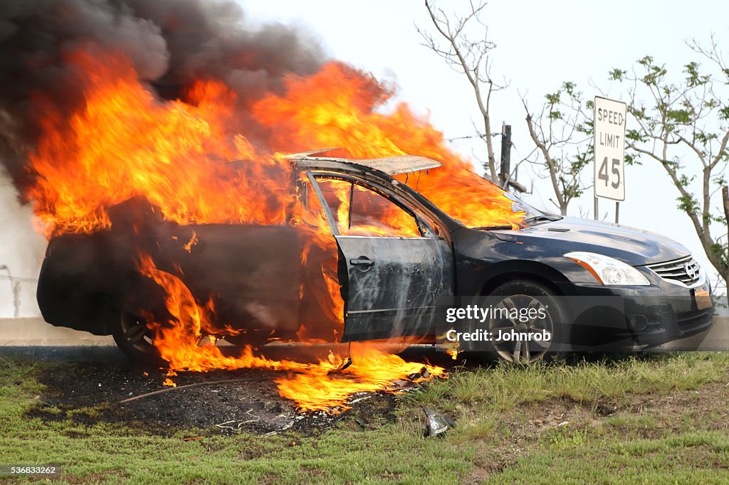 Car fire, burning profusely on New Jersey highway