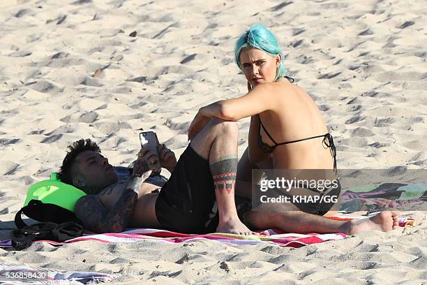 Federico Leonardo Lucia, known by his stage name Fedez, and girlfriend DJ Tigerlily are seen at Coogee Beach on May 3, 2016 in Sydney, Australia.