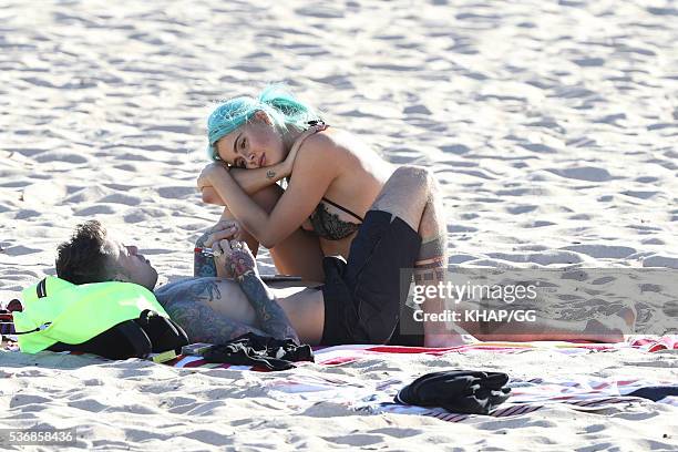 Federico Leonardo Lucia, known by his stage name Fedez, and girlfriend DJ Tigerlily are seen at Coogee Beach on May 3, 2016 in Sydney, Australia.