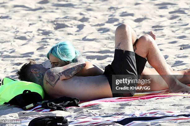 Federico Leonardo Lucia, known by his stage name Fedez, and girlfriend DJ Tigerlily are seen at Coogee Beach on May 3, 2016 in Sydney, Australia.