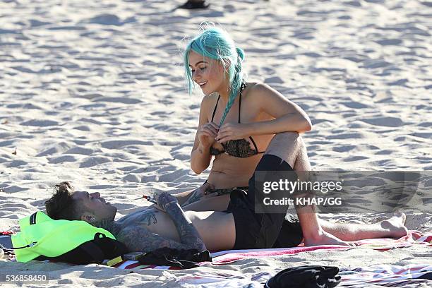 Federico Leonardo Lucia, known by his stage name Fedez, and girlfriend DJ Tigerlily are seen at Coogee Beach on May 3, 2016 in Sydney, Australia.