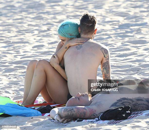 Federico Leonardo Lucia, known by his stage name Fedez, and girlfriend DJ Tigerlily are seen at Coogee Beach on May 3, 2016 in Sydney, Australia.