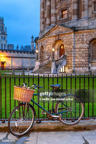 bicycle, radcliffe camera, oxford, england - oxford university stock pictures, royalty-free photos & images