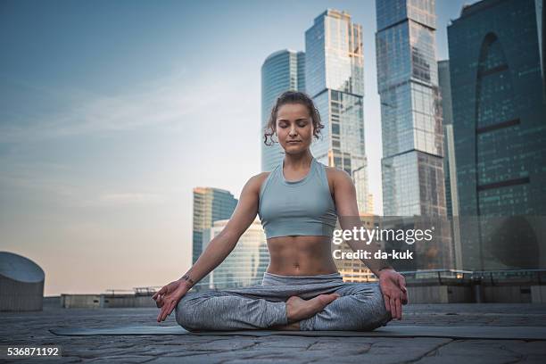 yoga meditation in lotus position - lotus position stock pictures, royalty-free photos & images
