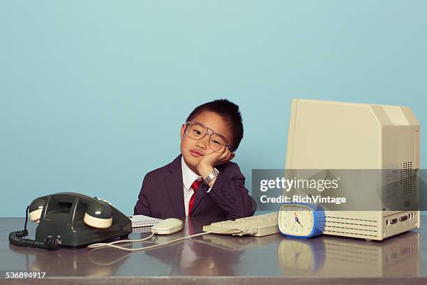 young japanese boy tired at the office - vintage stock exchange stock pictures, royalty-free photos & images