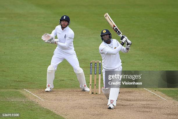 Angelo Mathews of Sri Lanka batting as Jonny Bairstow of England looks on during day three of the 2nd Investec Test match between England and Sri...