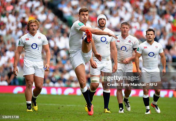 Ollie Devoto of England kicks the ball to touch during the Old Mutual Wealth Cup between England and Wales at Twickenham Stadium on May 29, 2016 in...