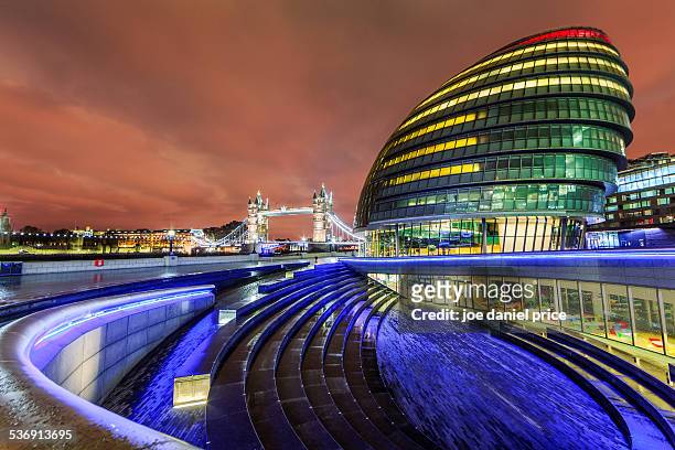 city hall and tower bridge at night, london - guildhall london stock pictures, royalty-free photos & images