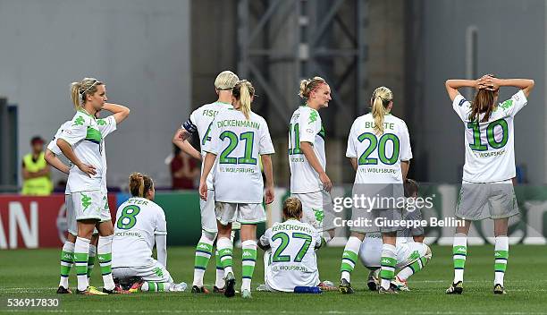 The players of VfL Wolfsburg look dejected after losing in the penalty shoot out at the UEFA Women's Champions League Final between VfL Wolfsburg v...