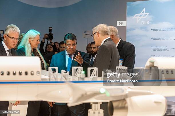 German Economics Minister Sigmar Gabriel, visting the stand of DLR at opening tour of the ILA Berlin Air Show in Berlin, Germany, 01 June 2016. The...