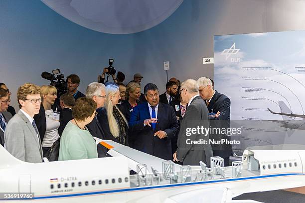 German Economics Minister Sigmar Gabriel, visting the stand of DLR at opening tour of the ILA Berlin Air Show in Berlin, Germany, 01 June 2016. The...